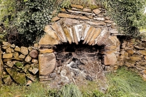 Connemara Ireland hillside cottage fireplace