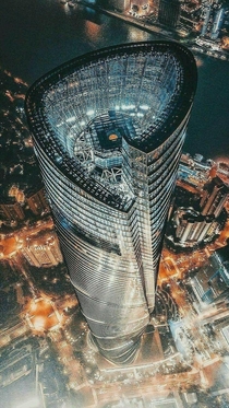 Cool view of Shanghai Tower At m its the worlds nd tallest building And its twisted shape is not only beautiful but also wind-resistant China