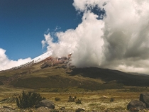 Cotopaxi Volcano covered in Clouds Ecuador  hermansjoris