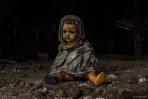 Creepy doll in abandoned house
