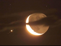 Crescent moon and Jupiter with  of its moons