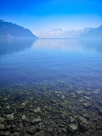 Crystal clear waters and the Alps Montreux Switzerland 