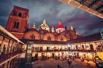 Cuenca Ecuador The cathedral domes are lit up with city colours