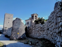 Cyclopean Pre-Roman walls a medieval watchtower and a XVII century church An example of historical and architectural stratification in Arpino Italy