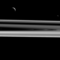 Dark Moons and Dark Rings of Saturn