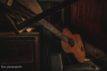 Dismantled guitar in abandoned house