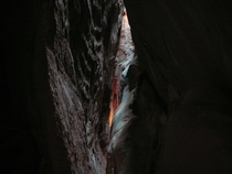Eerie lighting found in sandstone Bullet Canyon Utah 