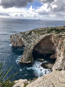 Elephant Rock off the coast of Malta Far off in the background is the tiny island of Filfla- once a practice target for the Royal Air Force now Bird sanctuary 