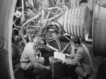 Engineers testing an RL- engine for a Centaur rocket at the NASA Lewis Research Center Propulsion Systems Laboratory Cleveland Ohio 