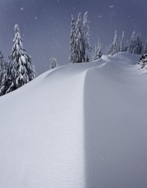 Enormous wind-formed snow comices at Crater Lake National Park 