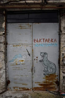 Entrance to the abandoned dinosaur exhibition inside an old Soviet state circus building 