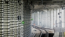 External reinforcement of concrete pillars for shinkansen tracks above near Fukuyama station in Japan
