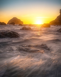Facing the sun I shot this Sunset on a beach in the city of Bandon in Oregon OC  IG johnperhach_photo_