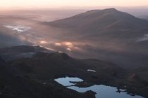 First light viewed from Snowdon summit Snowdonia North Wales 