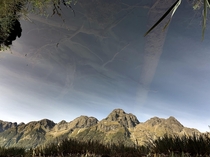 Flipped image of Mirror Lakes in Fiordland New Zealand 