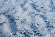Flying over Baffin Bay between Greenland and Nunavut Canada 