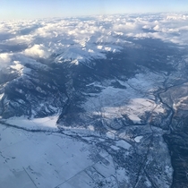 Flying over the snow covered Rocky Mountains last winter near Buena Vista CO a few minutes before landing at the Denver airport 