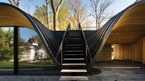 Fold House in Canada - Has a wavy roof with a staircase going from the middle 