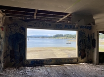 Found an old abandoned beach house in the Puget Sound in Washington State This is looming towards the Olympic Mountains
