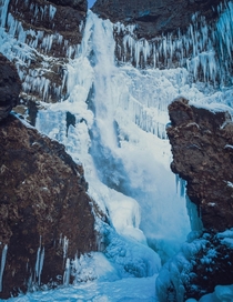 Found this secret frozen Icelandic waterfall 