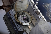 French Astronaut Thomas Pesquet peeking outside the airlock before repairing parts of the ISS during his Spacewalk two days ago