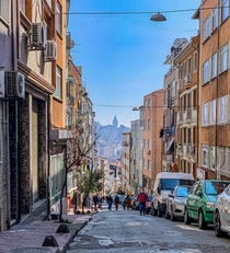 Galata Tower looms large over a residential street - stanbul 