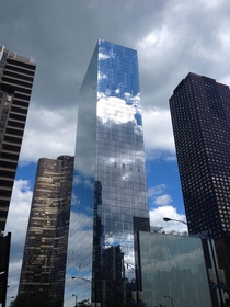 Glass melding into the sky in Chicago 