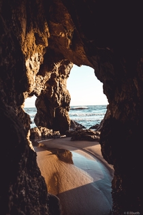 Golden hour through the archways at El Matador Beach CA 