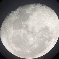 Got a telescope as an early Fathers Day Australia present and this is picture I tried taking of the moon with my phone It will be the first of many once I learn how to do it properly