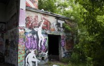 Graffiti on abandoned workshop in Berlin by Daan Botlek