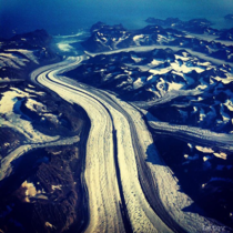 Greenland Glacier carving its path into the ocean 