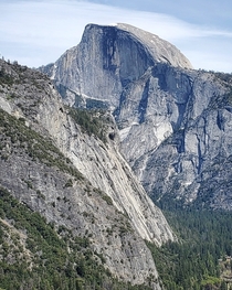 Half dome towering over the valley below Yosemite National Park CA USA 