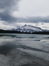 Half frozen lake in Banff National Park Alberta Canada 