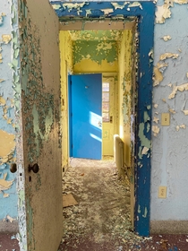 Hallway in an abandoned asylum IG austinschacht