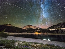 Happy New Years Eve Heres some celestial fireworks a composite of  meteors over Lassen Peak in Northern California 
