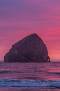 Haystack Rock at sunset Oregon Coast 