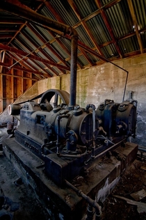 Heres another one from the abandoned mine machine room I posted recently Perhaps someone can help identify and date the type machinery here Very curious OC x