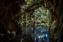Hidden cave entrance at Quinta da Regaleira in Sintra Portugal 