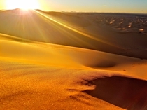Hike up to the dunes to see the sunset at Merzouga Dunes Morocco