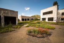 Hospital and garages in abandoned Colorado mining town operational s-