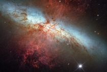 Hubble Space Telescope composite image of a supernova explosion designated SN J in the galaxy M taken Jan  