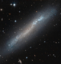 Hubble targets a tilted galaxy named NGC 