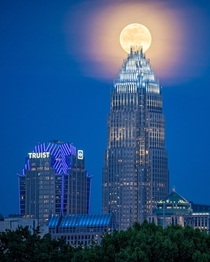 I hope everyones not sick of the Pink Moon yet I took this right as the moon was rising over the BOA Tower in Charlotte NC