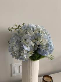 I make a bouquet from discount flowers at the grocery store I am very happy with how this weeks turned out  Blue Hydrangeas with Dianthus Green Balls