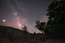 I photographed the Milky Way while hundreds of fireflies danced around the countryside in West Virginia 