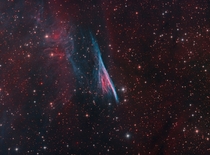I took this  hour exposure of the Pencil Nebula over march from my backyard