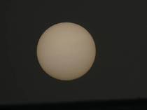 I took this picture of the sun when a dust storm blew through It was so strange how dim it was