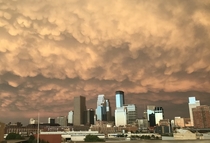 I took this while driving through Minneapolis over the summer Hands down the craziest sky Ive ever seen