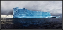 Iceberg off the coast of Greenland  photo by Taimas