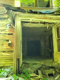 If you look closely in the second doorway there are two holes that I swore were eyes